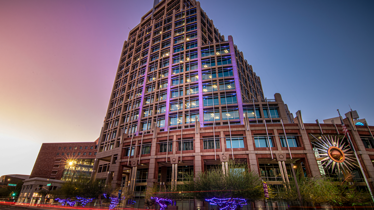Phoenix City Hall lit up purple at night for October 