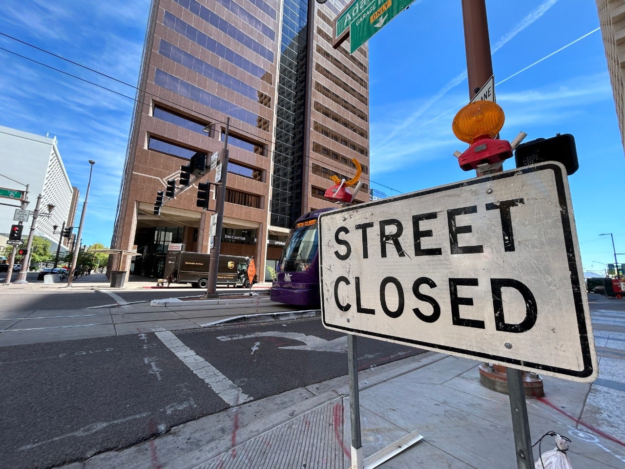 Photo of a road sign that reads street closed.
