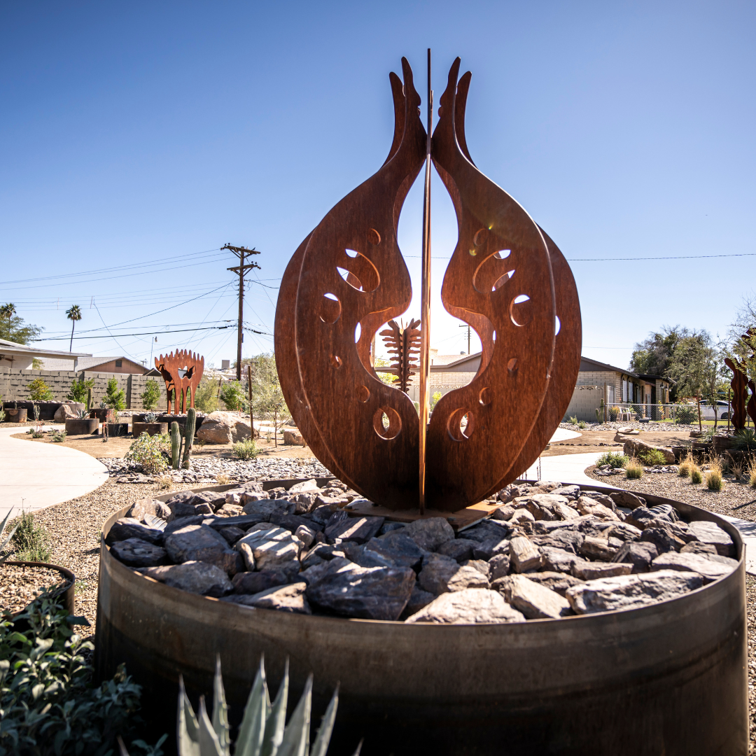  Art piece stationed in a desert landscape.