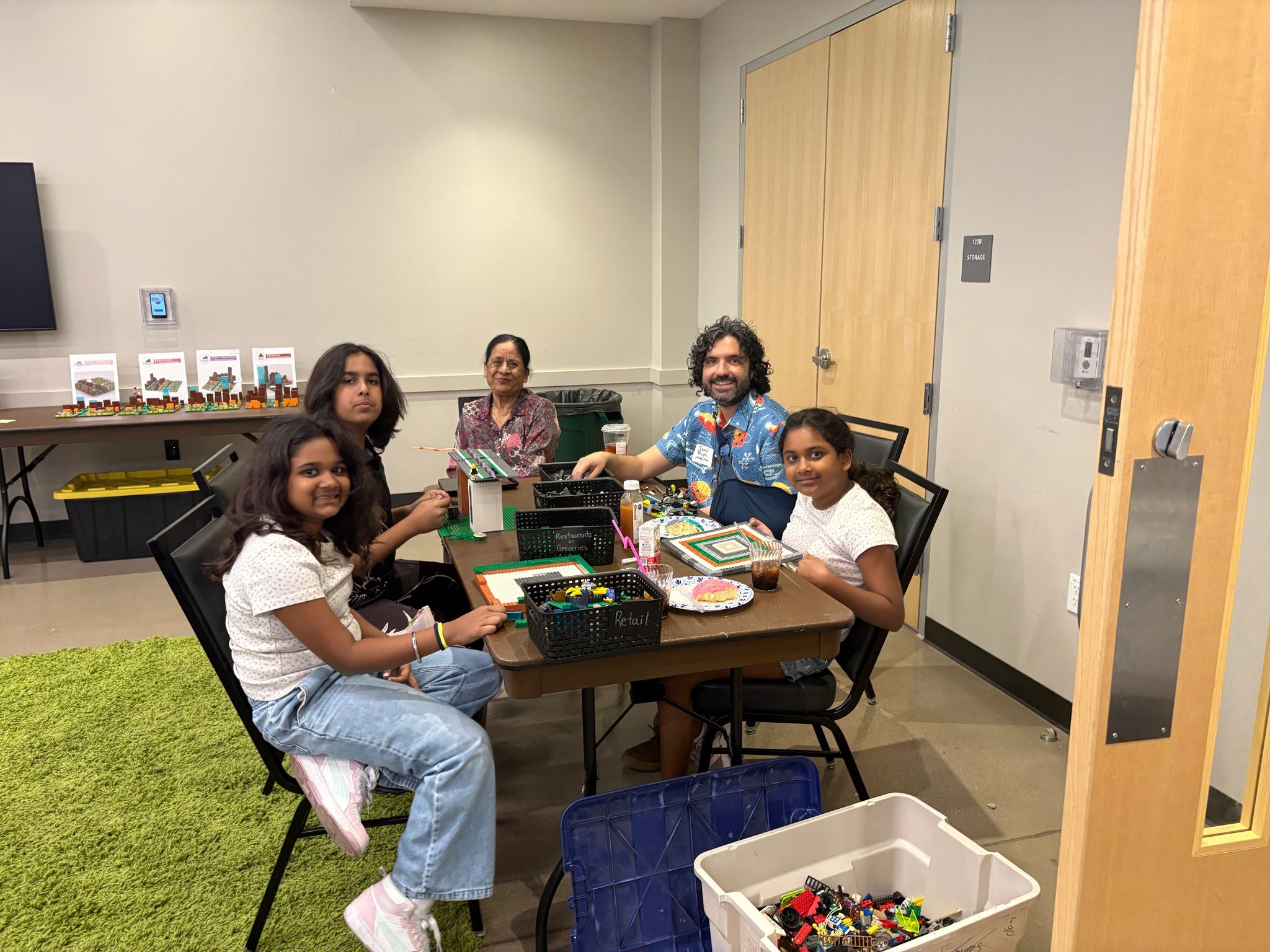 Planning staff interacting with family