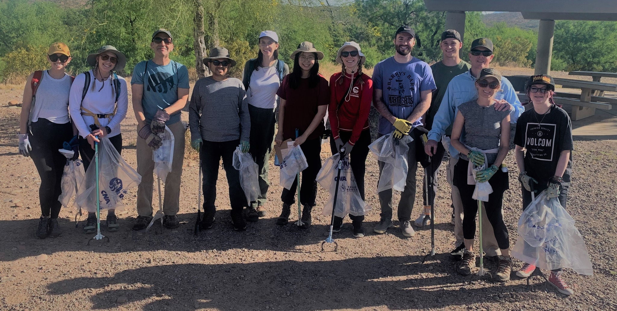 HDR Inc. employees posing for a picture after a community clean-up event.