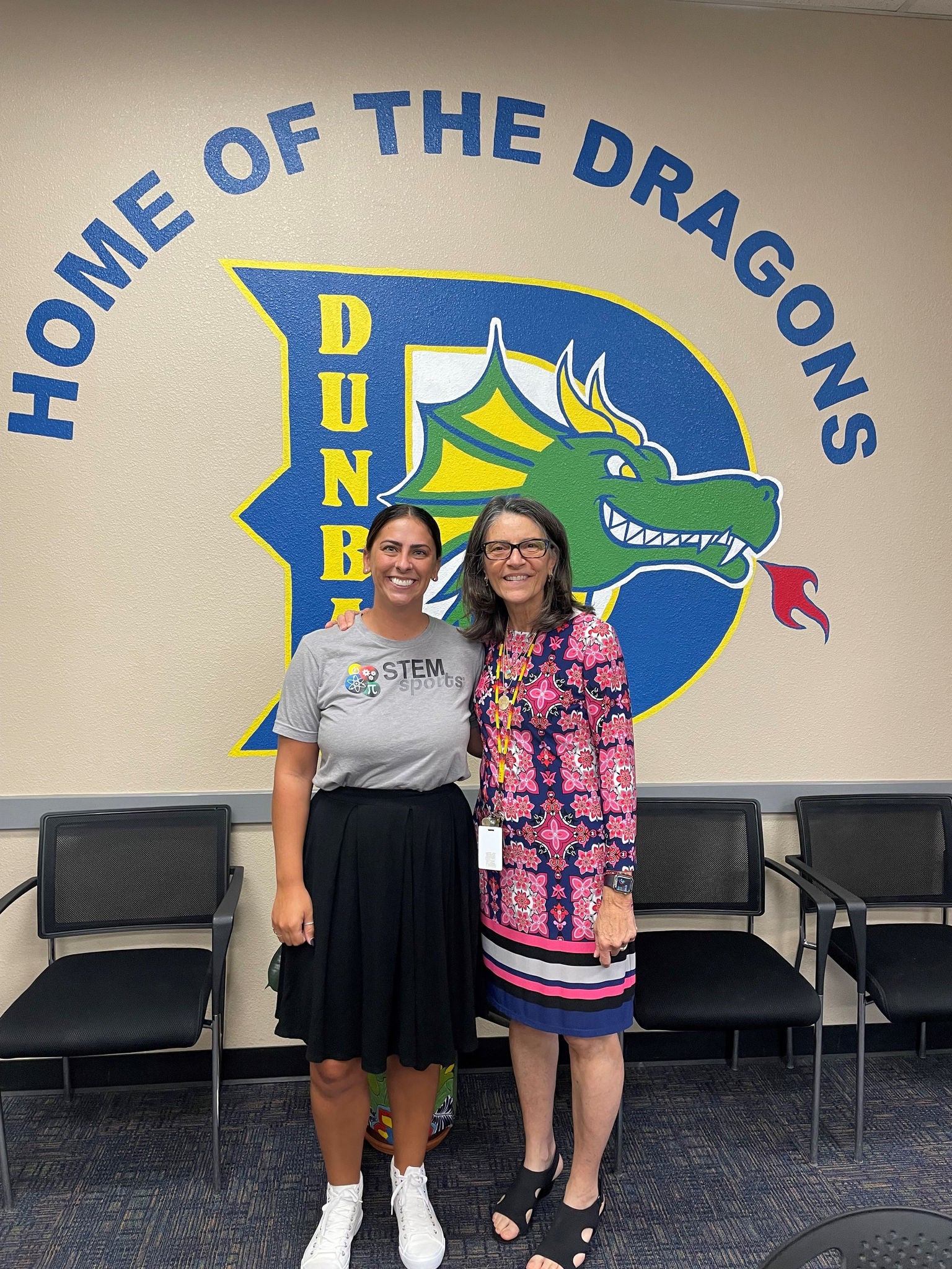 Staff from Dunbar Elementary meet with partnering business