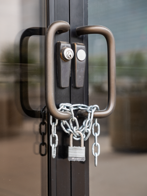 Chain and lock on front door of former Police Headquarters following the decommissioning ceremony.