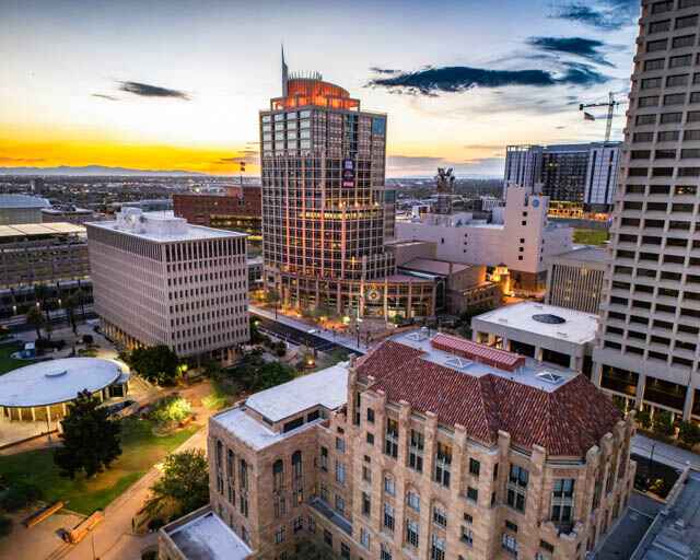 Aerial shot of downtown Phoenix at dusk.