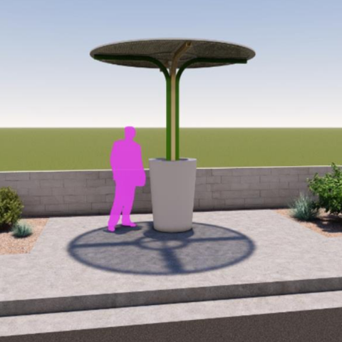 person standing under shade structure with concrete base