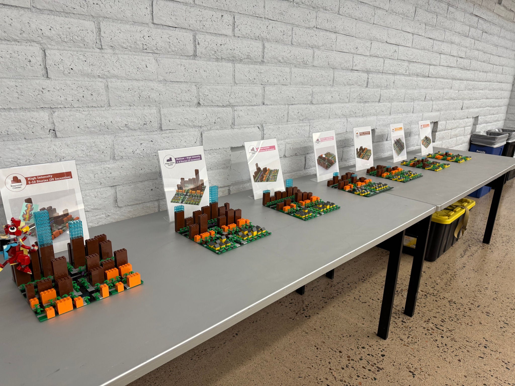 Tables pushed back against the wall with transect district intensity of development displays