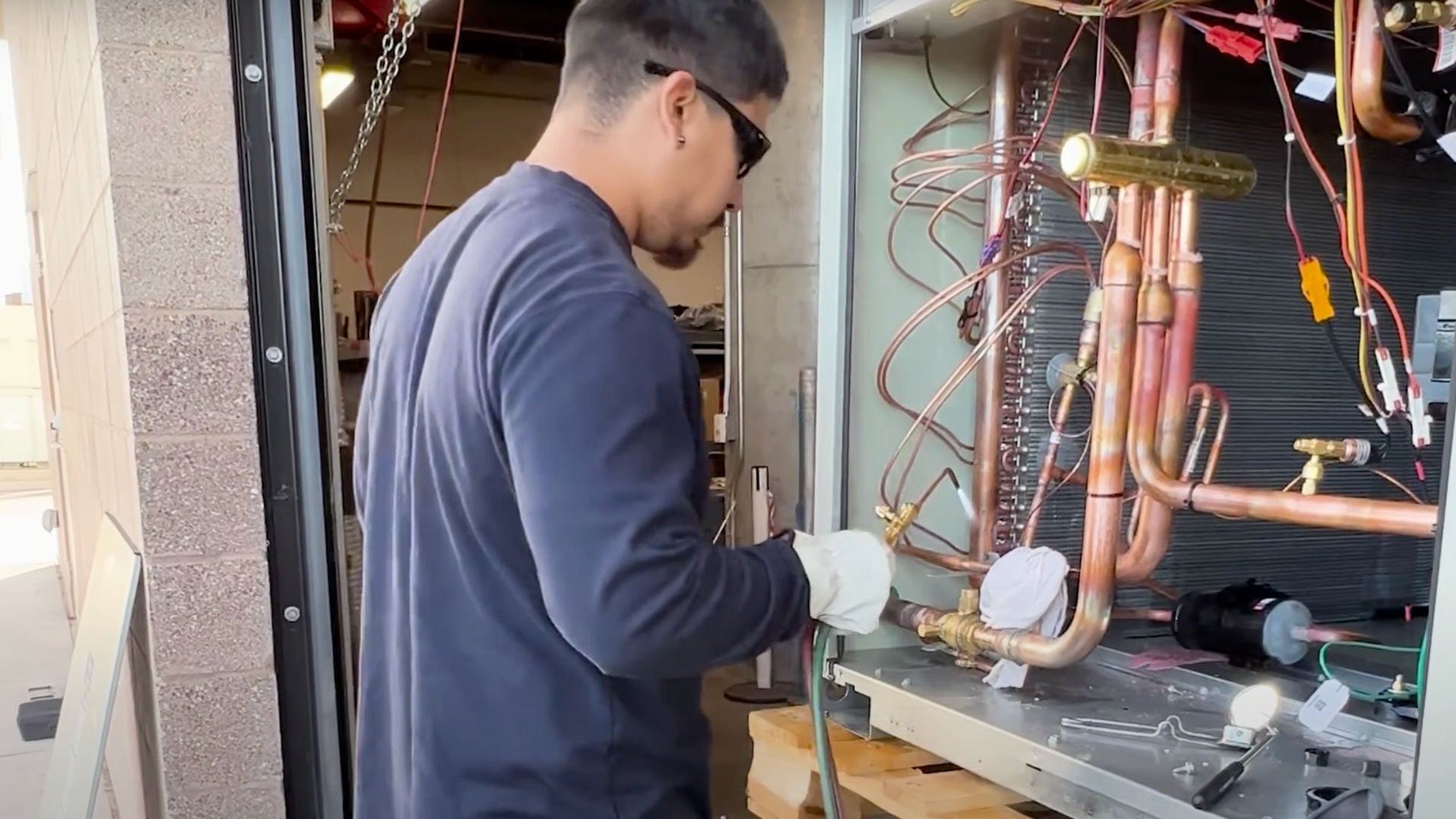 HVAC Apprentice soldering pipes 
