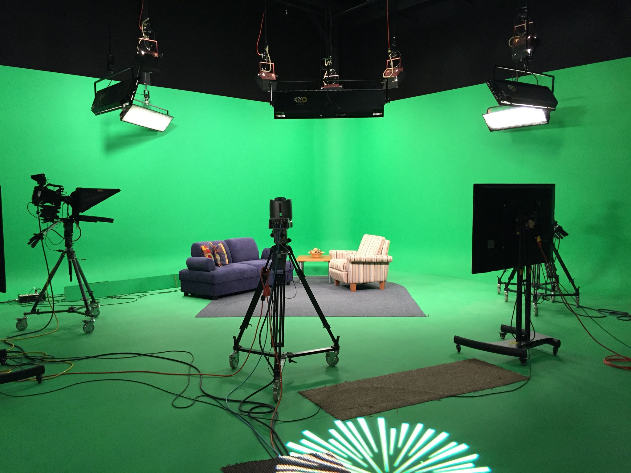 Phoenix media studio in front of a green screen