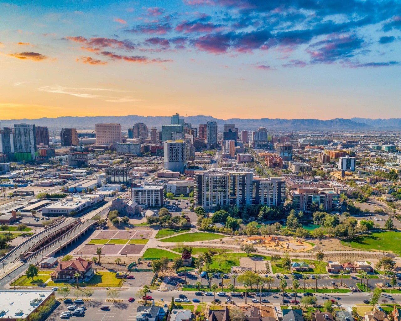 Arial shot of downtown Phoenix during a sunny day, with Hance Park in the foreground.