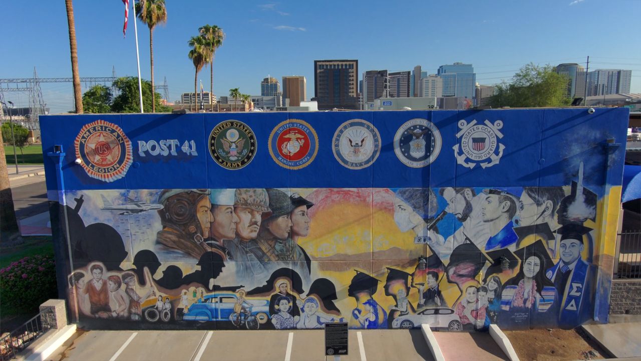 Mural from American Legion Post 41 showing World War Two veterans and families